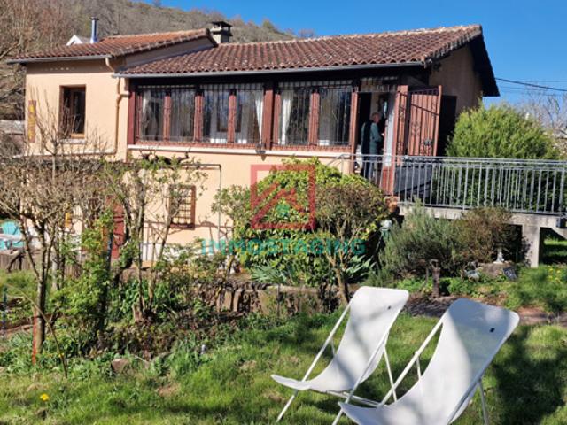 Maison avec terrain en bord de rivière