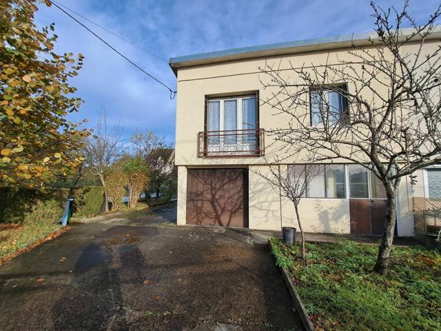 Maison avec beau jardin