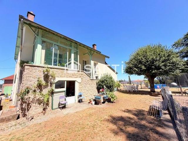 Maison avec dépendance et terrain constructible