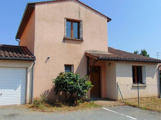 MAISON AVEC GARAGE ET JARDIN