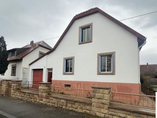 Maison avec garage et jardin