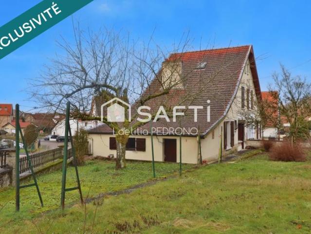 Maison avec garage, jardin et cave