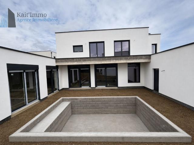 Maison avec gros oeuvre clos couvert