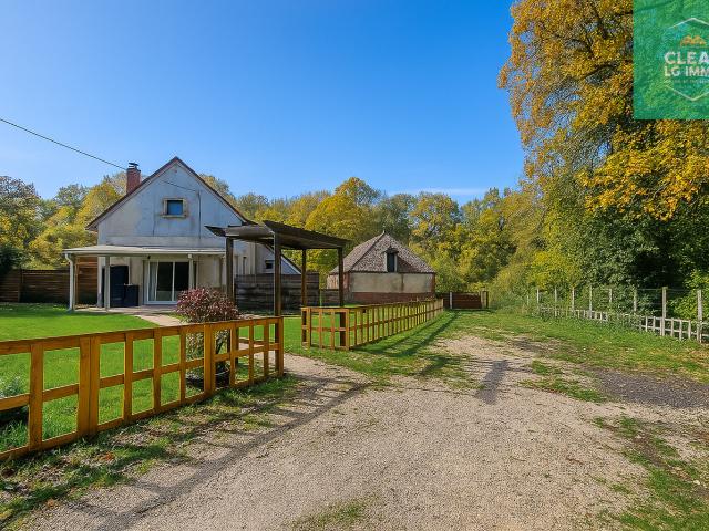 Maison avec grange et grand terrain