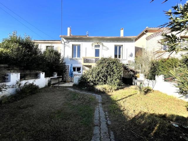 Maison avec grand garage