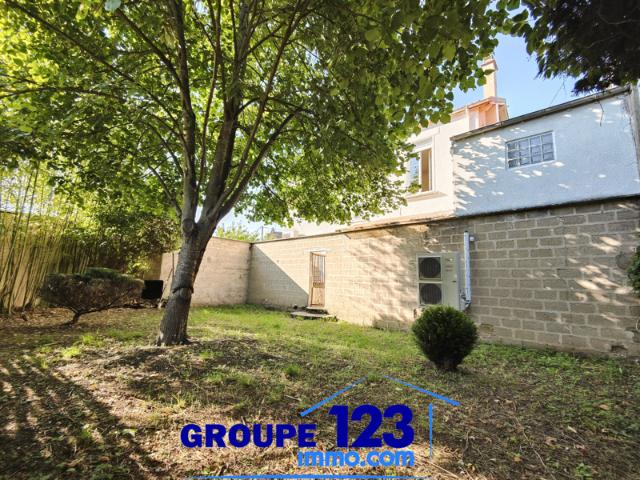 Maison avec local loué à Migennes Vivez et investissez en