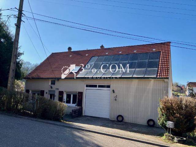 Maison avec PAC et panneaux photovoltaïques