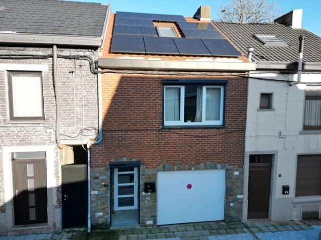 Maison basse énergie en parfait état avec garage et jardin