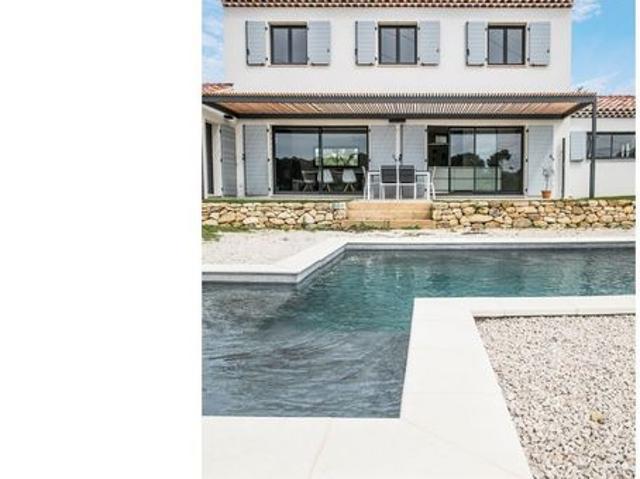 Maison d’exception – Élégance, volumes et performance énergétique en RE2020