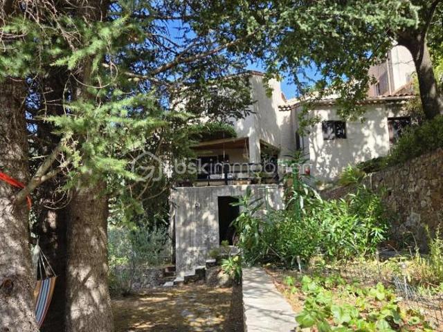 Maison d'architecte atypique 6 pièces sur un terrain de 2000 m2, piscine, 2 garages, vue dominante sur les Cévennes