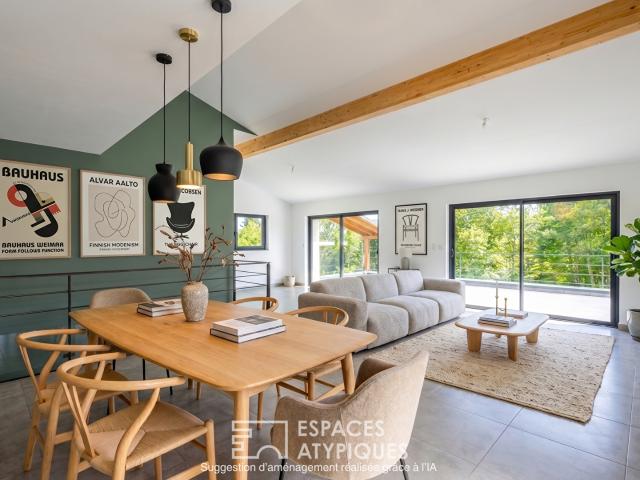Maison d'architecte et ses terrasses entre montagne et forêt