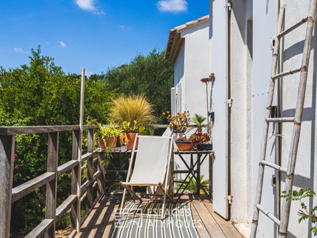 Maison d'artiste et son écrin végétal