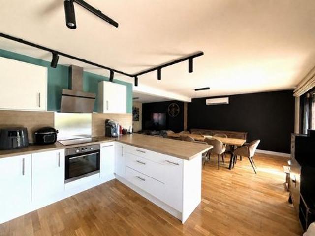 Maison de 109m², 4 chambres, garage et jardin