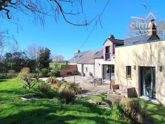 Maison de 114.90 m² habitable sur 1800 m² environ de terrain et un grand garage