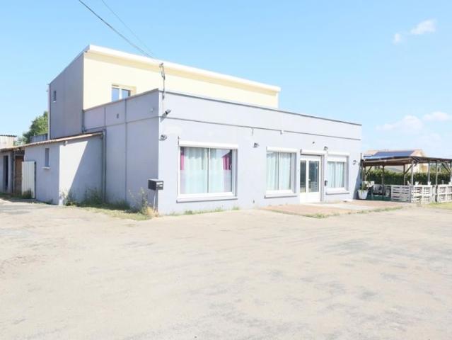 Maison de 188m2, 5 chambres, avec garage sur terrain de 1900m2