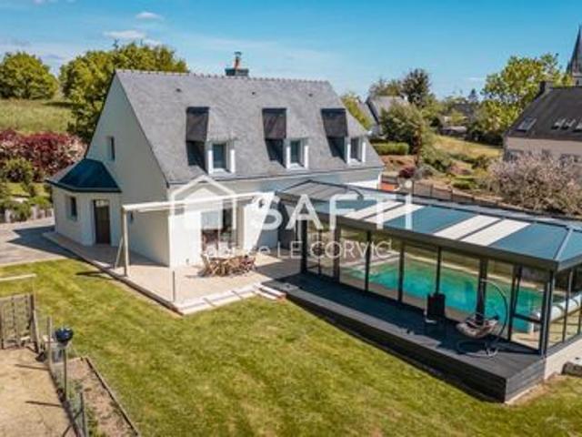 Maison de 205 m2 sur terrain de 2520 m2 constructible avec piscine couverte