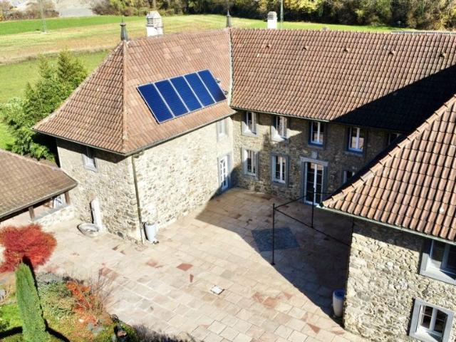 Maison de 405 m2 avec terrain de 4'413 m2 à Bex