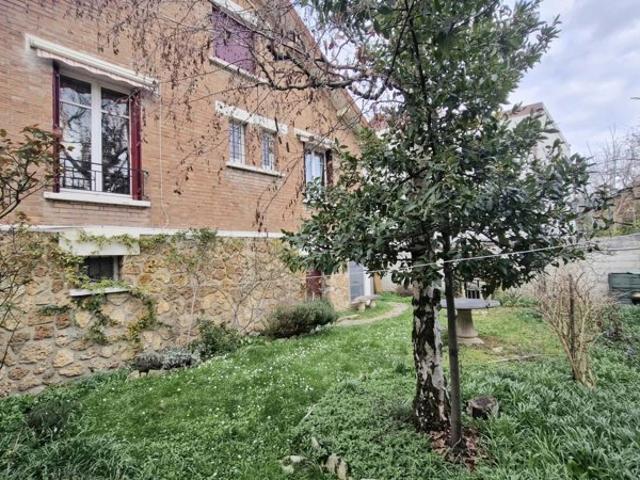 Maison de 4 pièces de 111 m², garage, jardin