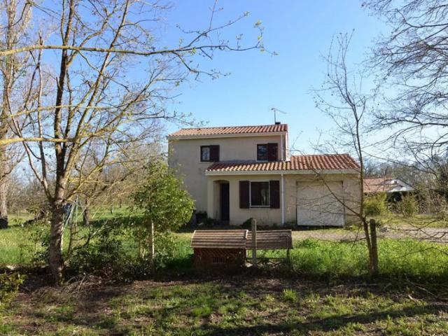 Maison de 88 m² avec beau terrain, au calme