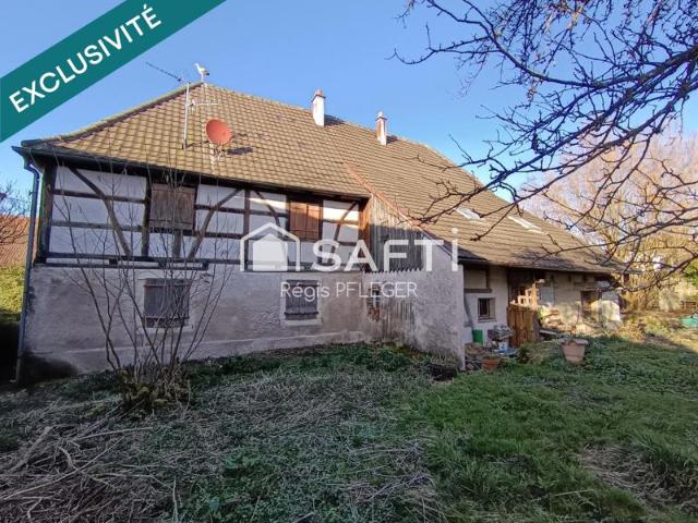 Maison de caractère avec beau potentiel