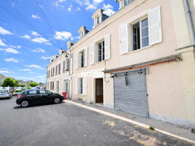 Maison de bourg avec surface commerciale