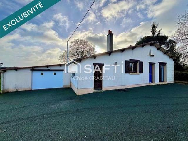 Maison de plain pied, 89 m² habitables, garage