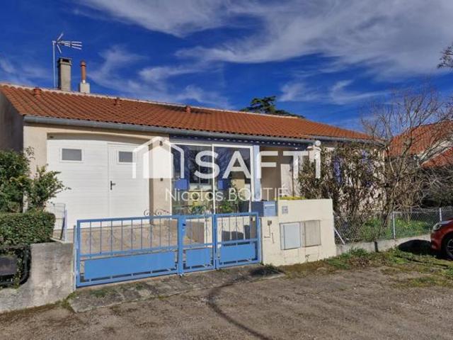 Maison de plain pied avec garage et dépendance