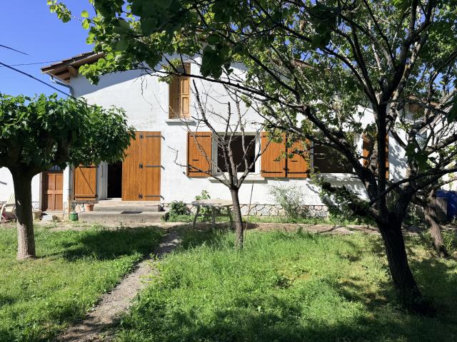 MAISON DE PLAIN PIED AVEC GARAGE ET JARDIN