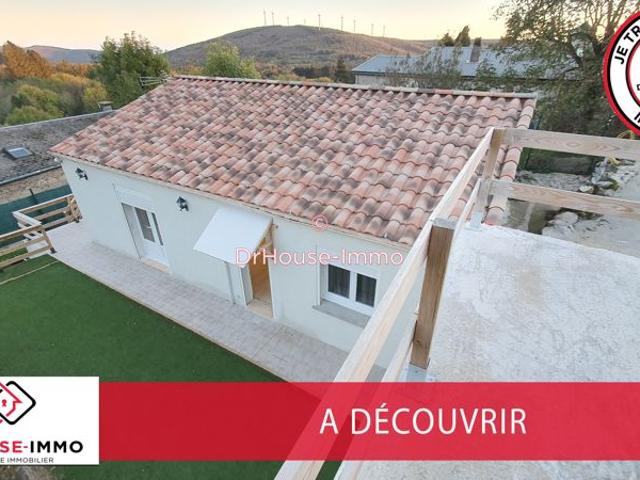 Maison de plain pied avec garage et jardin