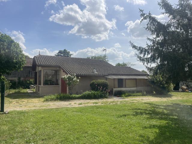 Maison de plain pied avec garage et jardin. 80m² Tonneins