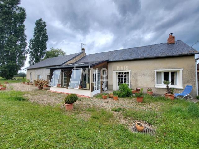 Maison de plain pied avec grand terrain