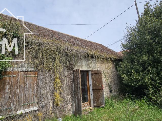 Maison de plain pied avec grange et jardin