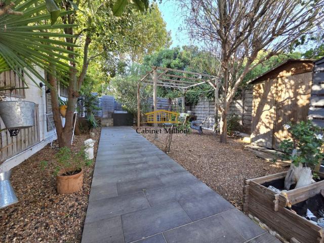 Maison de plain pied avec jardin