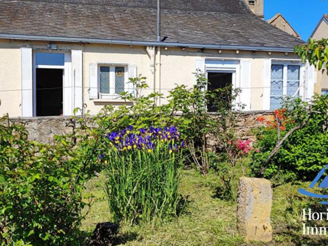 Maison de plain pied avec jardin et garage !