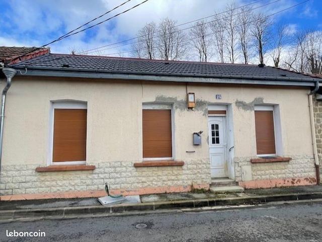 Maison de plain pied avec jardin et garage