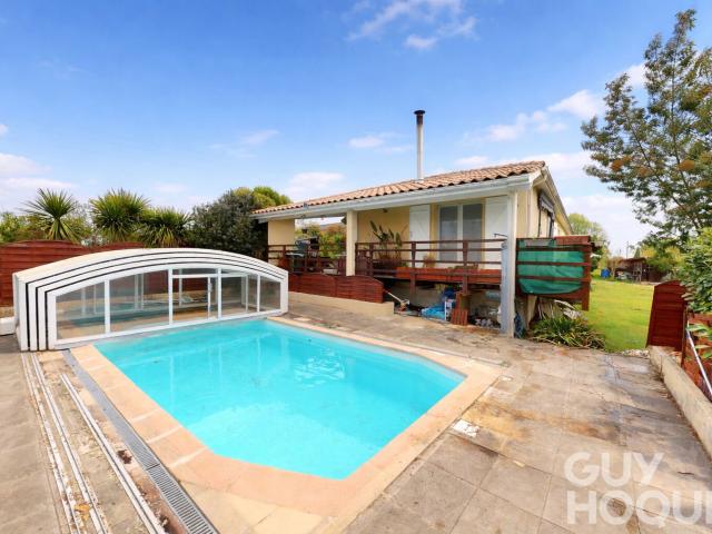 Maison de plain pied avec piscine couverte et terrain végéta. 127m² Hagetmau