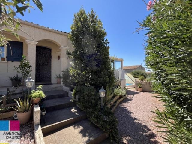 Maison de plain pied avec piscine sur 506 m² de terrain