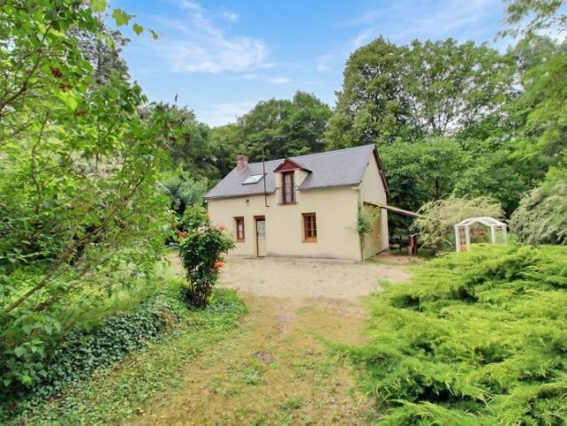 Maison de plain pied dans environnement verdoyant