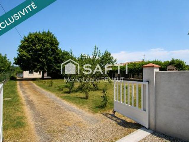 Maison de plain pied 95m² DPE B Terrain env. 2500m² Garages et dépendances 3 chambres