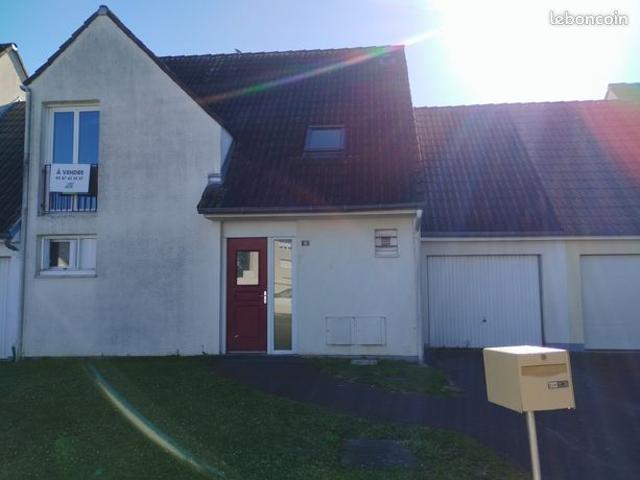 Maison de type 4 avec garage et jardin