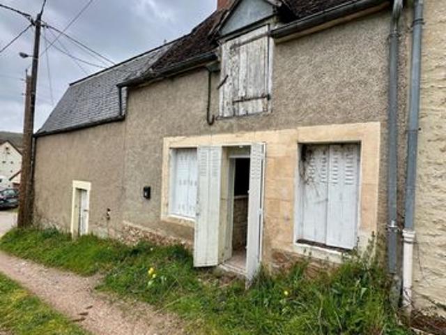 Maison de village à rénover avec grange attenante
