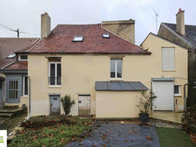 Maison de ville avec garage et courette