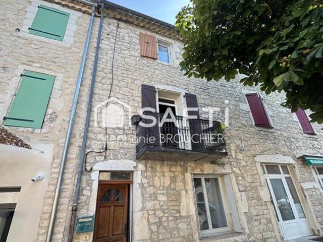 Maison de village avec garage et jardin