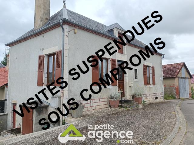 Maison de village avec jardin et dépendances
