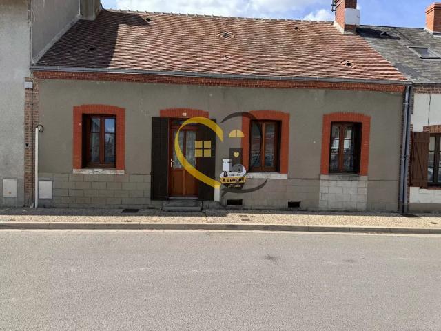MAISON DE VILLAGE AVEC JARDIN, GARAGE FORT POTENTIEL !