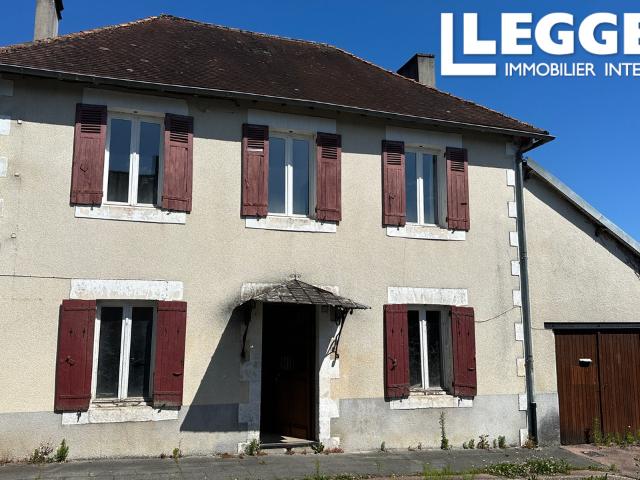 Maison de village de 3 chambres avec garage et jardin à rénover