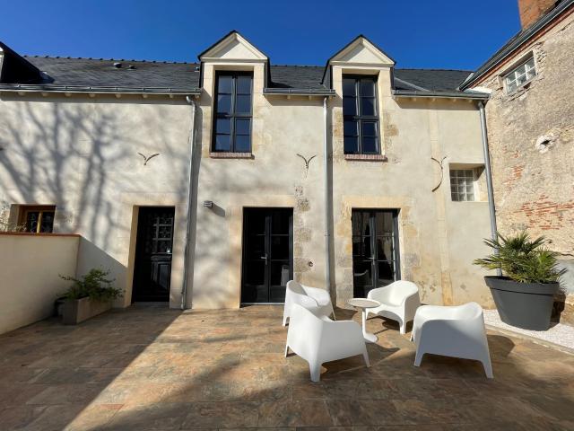 Maison de ville à louer au calme avec belle terrasse