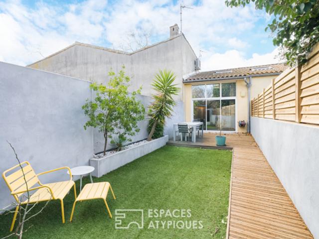 Maison de ville au style loft avec jardin et places de stationnement