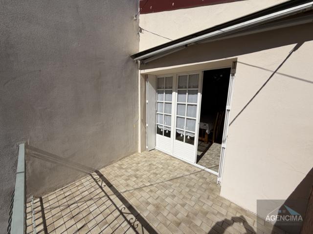 Maison de ville avec garage et terrasse