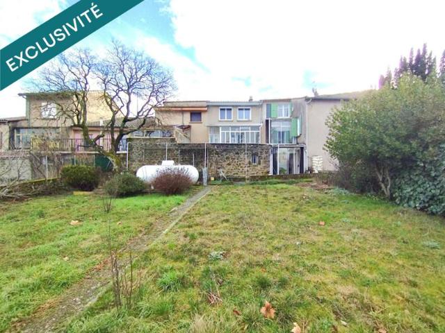 Maison de ville avec garage et jardin à quelques pas du centre ville